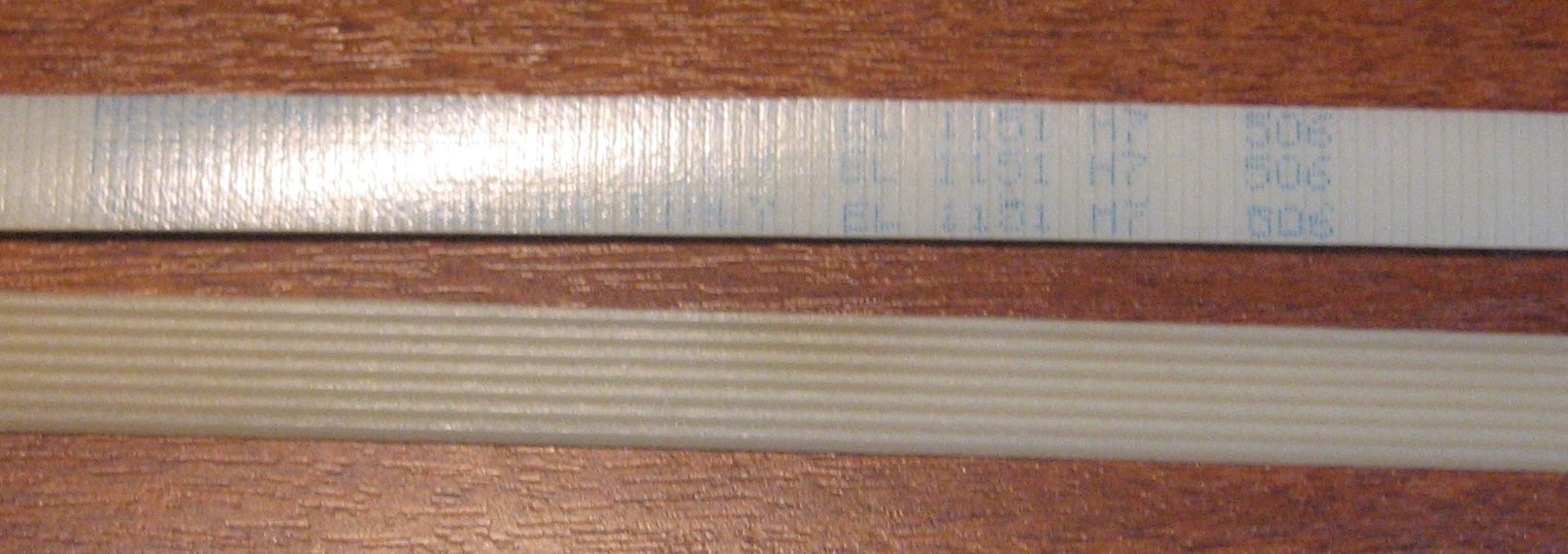Ремень поликлиновый 1151 H7 (EL1151H7 / 7PHE1151 / 7EPH1151) (белый / черный)