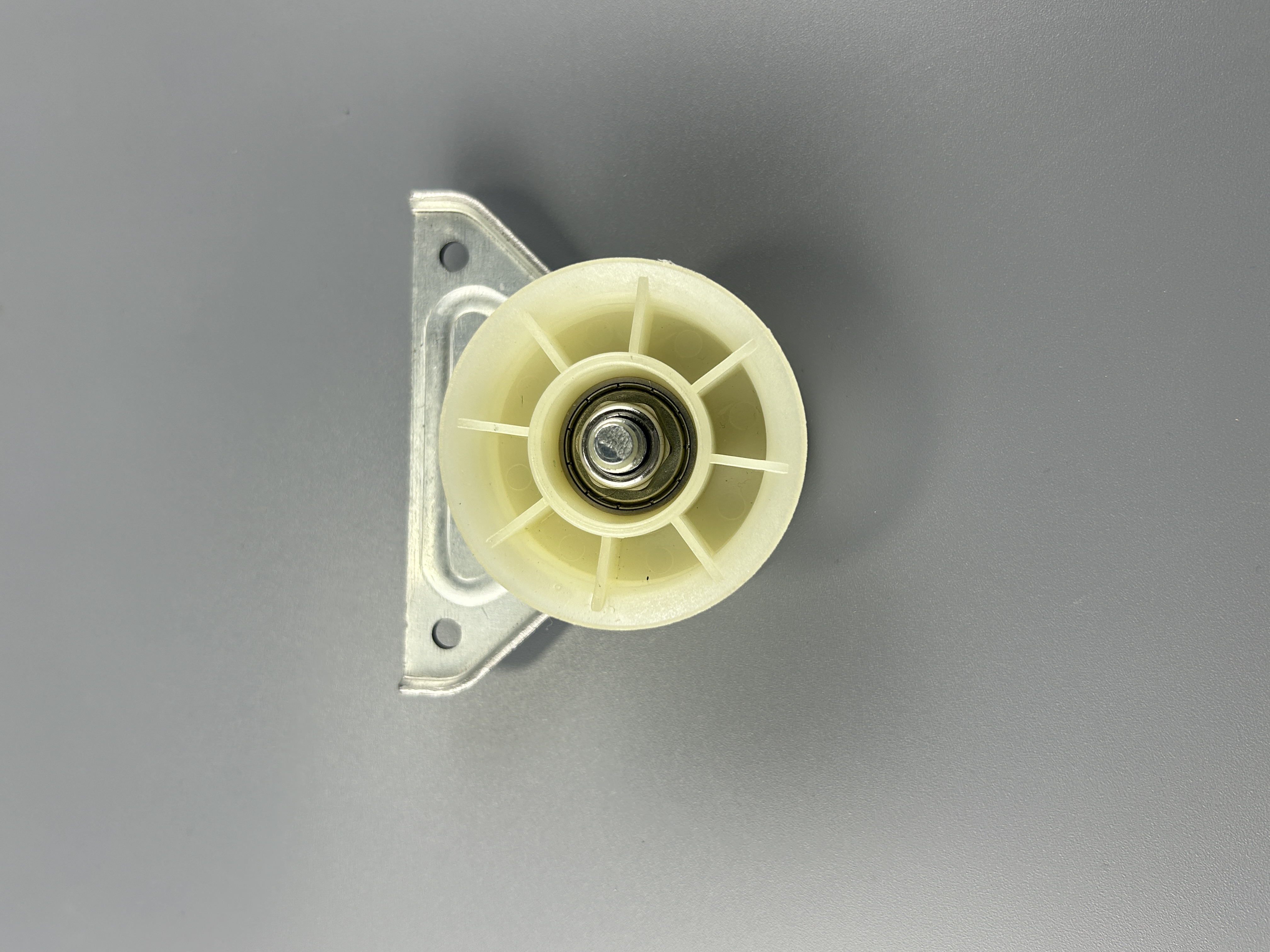 Ролик натяжной для сушильной машины Indesit C00504520